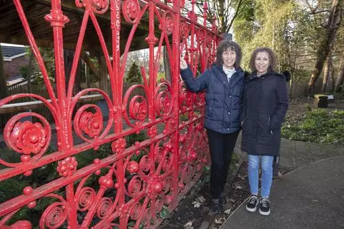 Helen Hunter and Julie Bernicoff with the Strawberry Field Gates in Liverpool