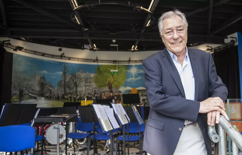 Cliff Cooper Founder and CEO of Orange Amps in front of the Strawberry Field Bandstand