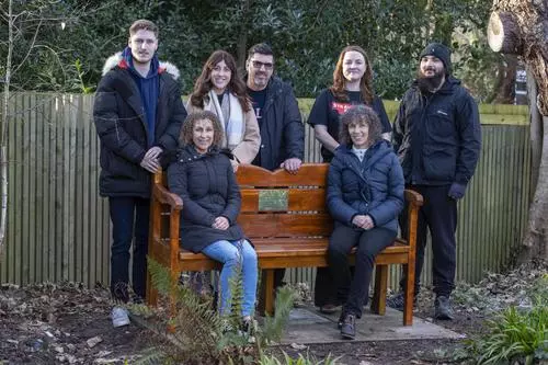 Peter Lavin, Adele Murphy and Leon and June Bernicoff's family sat on the memorial bench