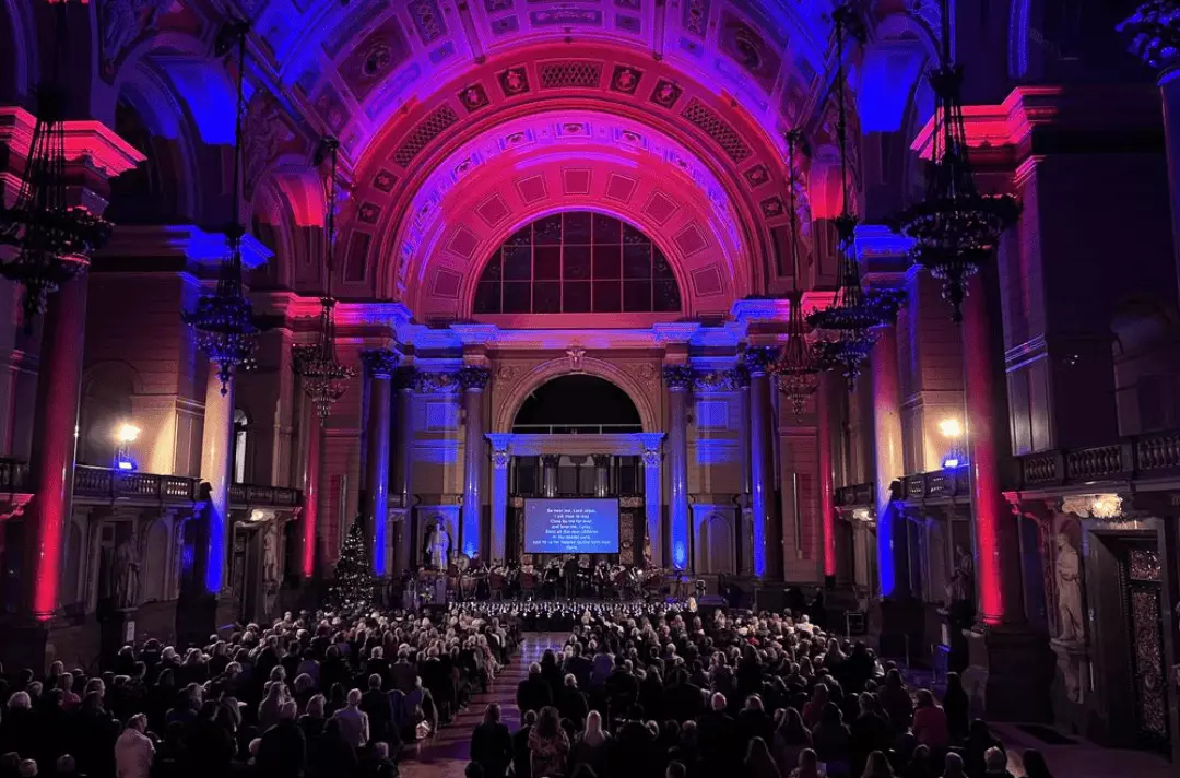 The Great Hall at St George's Hall with audience watching Celebrating Christmas with Strawberry Field