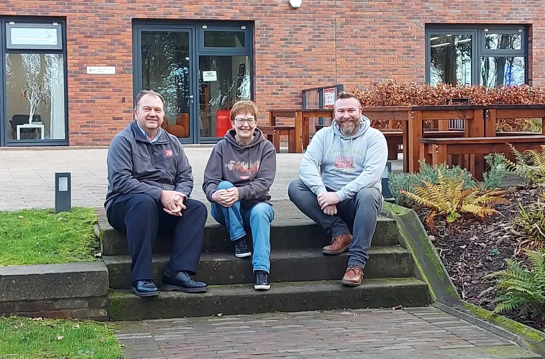 Photo of the FX team sitting outside together in February 2022