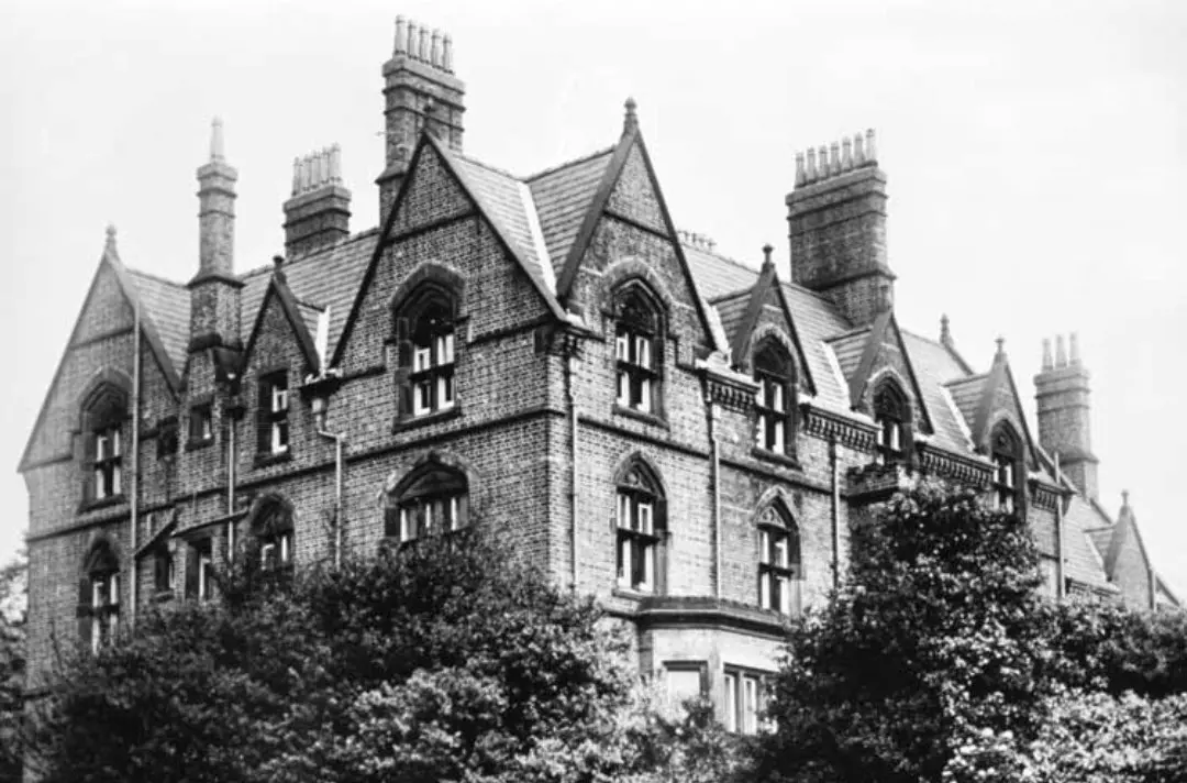 an old black and white image of the house at Strawberry Field