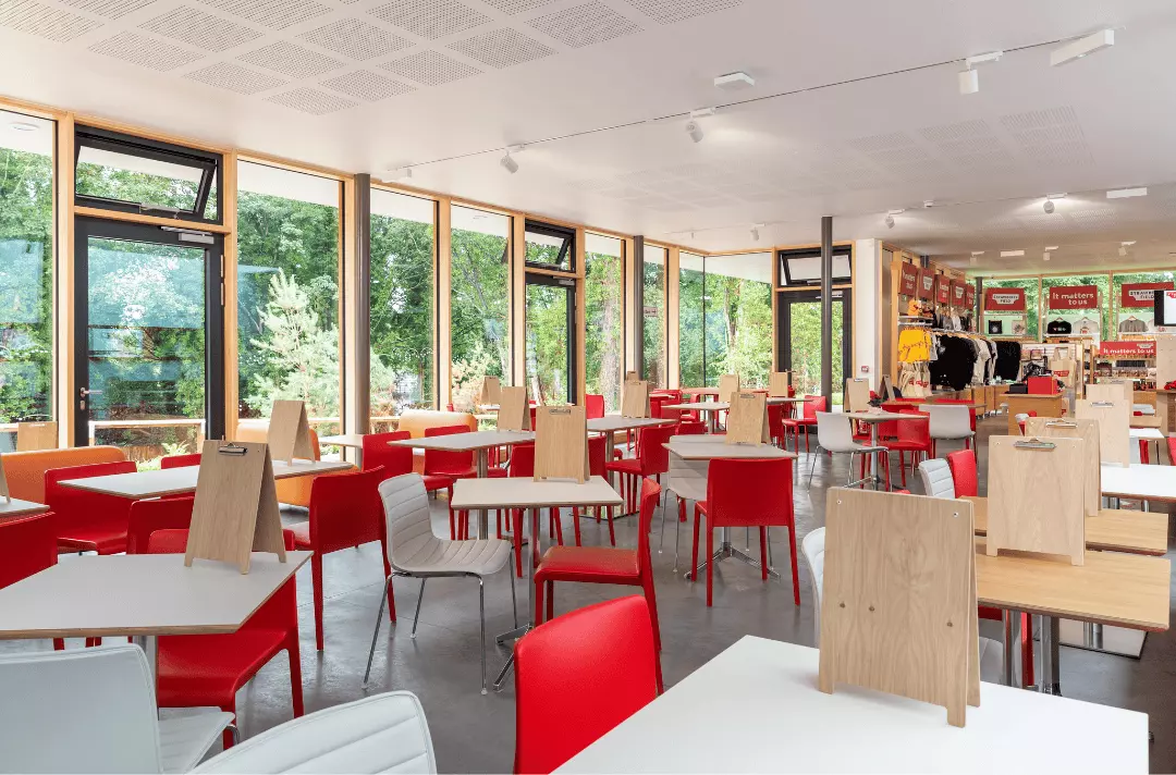 Strawberry Field centre available for hire. Large room with tables and chairs and floor to ceiling windows