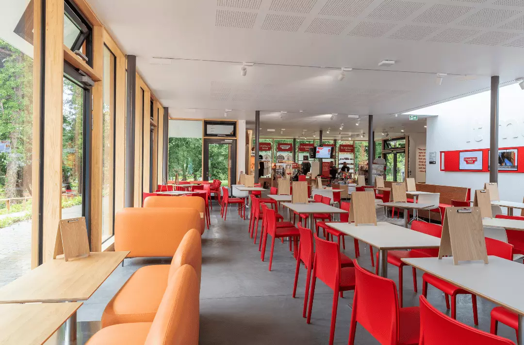 Strawberry Field centre available for hire. Large room with tables and chairs and floor to ceiling windows
