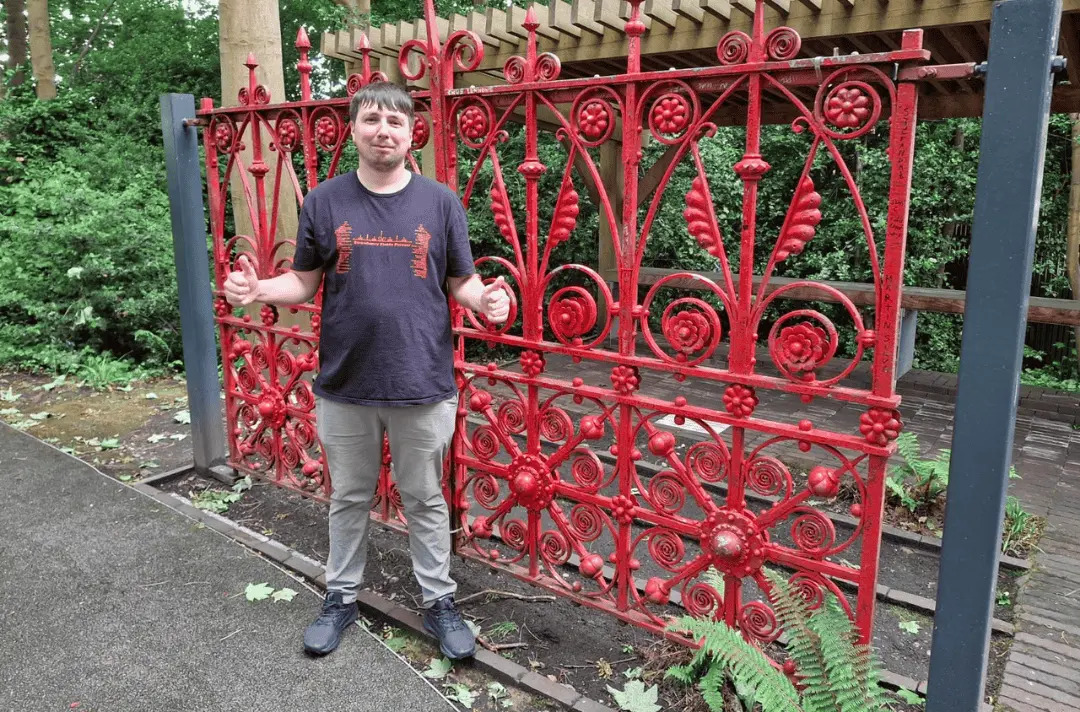 Steven stood by the original red gates