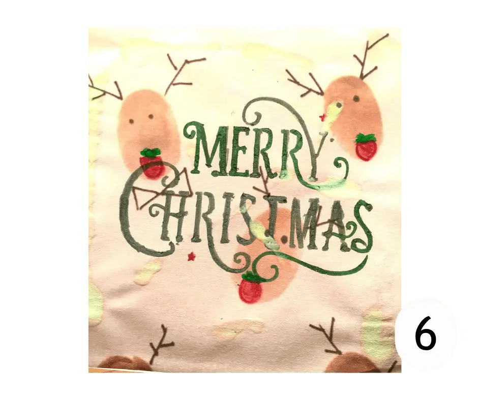 Christmas card depicting three reindeers with strawberries for noses and the words 'Merry Christmas'