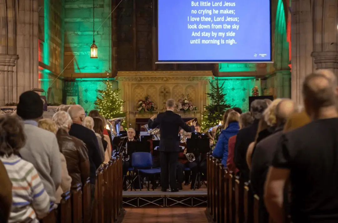 Salvation Army Walton Band playing at All Hallows Church for Celebrating Christmas with Strawberry Field